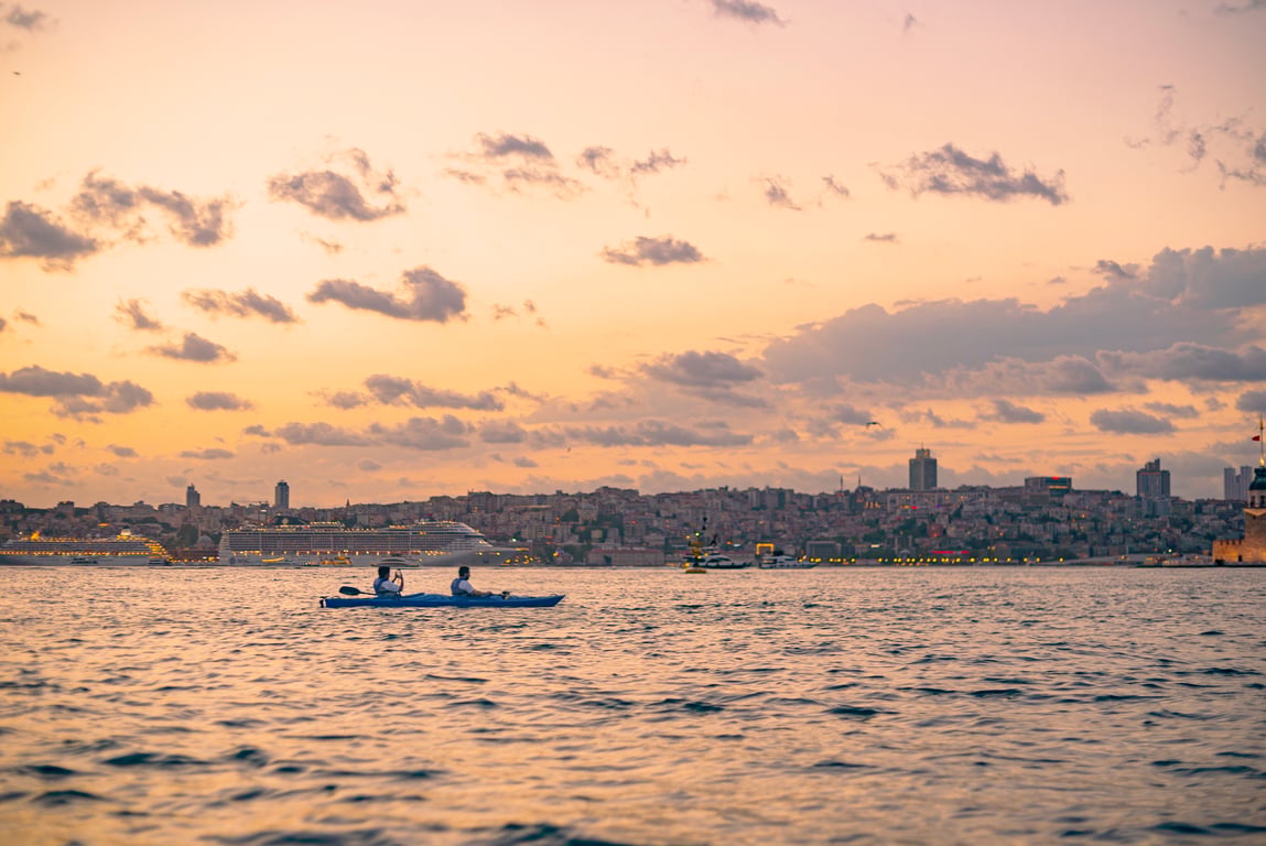 The historic Istanbul skyline seen from a canoe between Europe and Asia