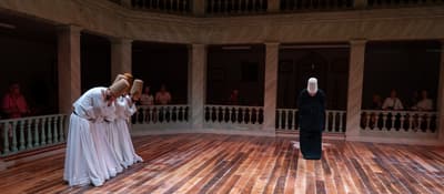 Whirling dervishes bowing to their sheikh at the start of a Sufi sema ceremony in Istanbul.