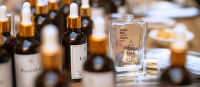 Amber essence bottles beside an Istanbul Workshops flacon at a perfume-making workshop in Istanbul
